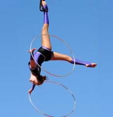 Tanya Drewery uses the foot loop in her aerial hula hoop performance in Gravity and Other Myths 