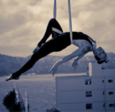 Tanya Drewery on the straps in front of Wellington Harbour. 